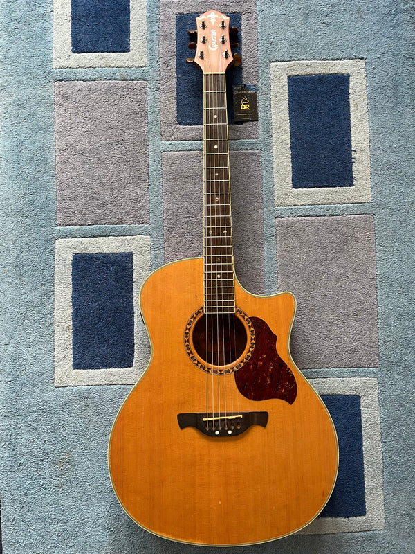 Used Crafter GAE7-N Electro acoustic guitar. Solid Cedar Top.