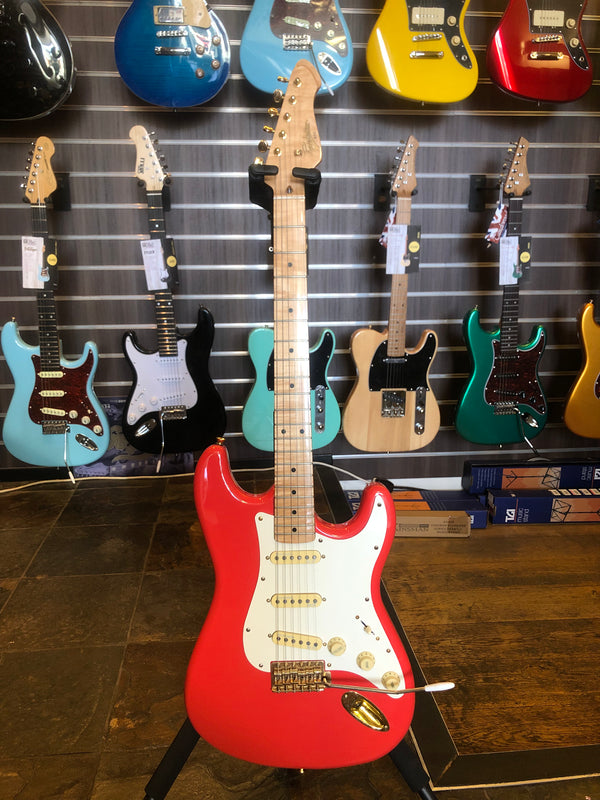 Used Revelation S-Style Electric guitar. Red.