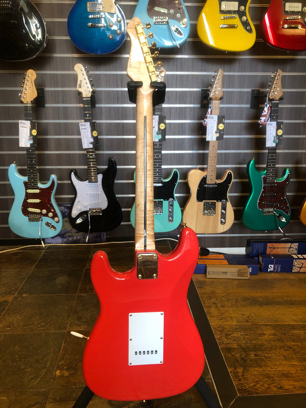 Used Revelation S-Style Electric guitar. Red.