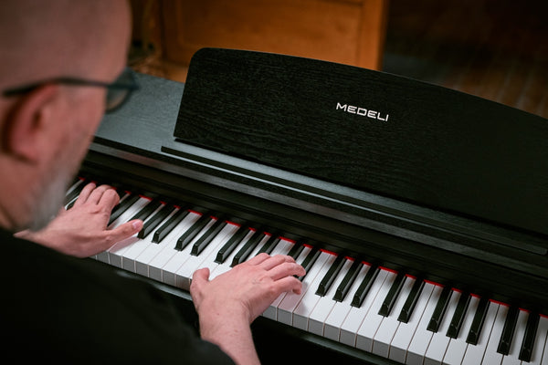Medeli EDUCATIONAL Series Digital Upright Piano. 88 Key. Black with Package options. Black.