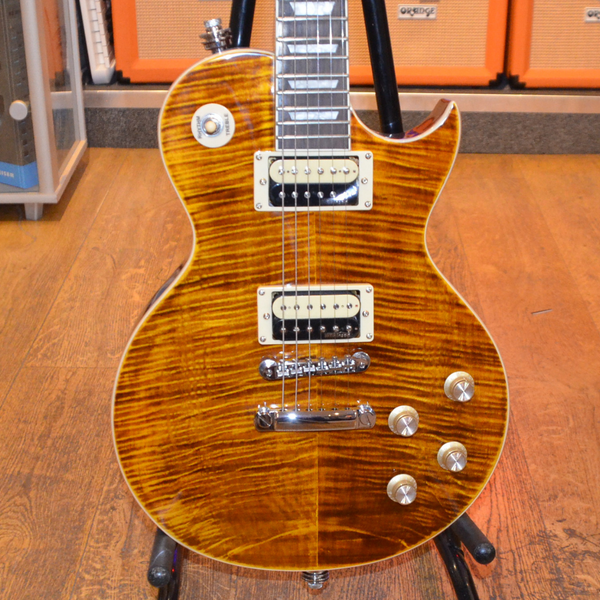 Vintage V100AFD Les Paul Electric Guitar with Flamed Amber Top.
